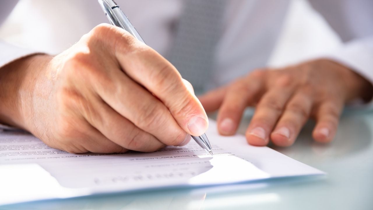 person filling a form